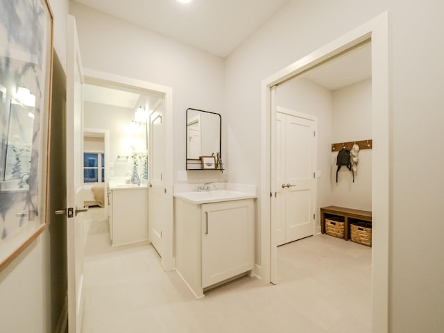 ensuite bathroom featuring vanity and ensuite bathroom