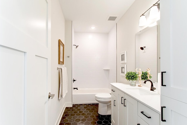 bathroom featuring visible vents, shower / washtub combination, toilet, tile patterned floors, and vanity