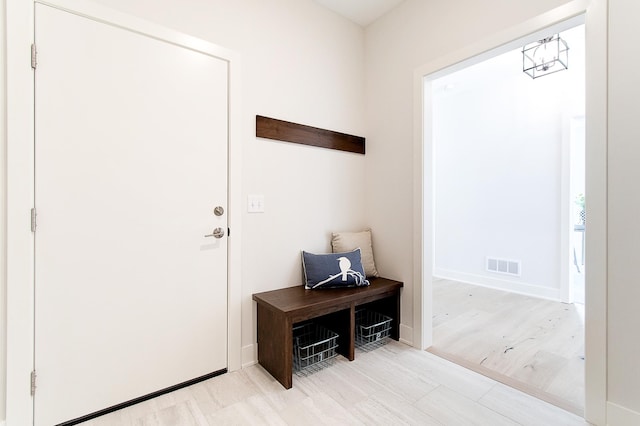 mudroom with visible vents and baseboards