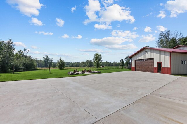 exterior space featuring an outdoor structure and a garage