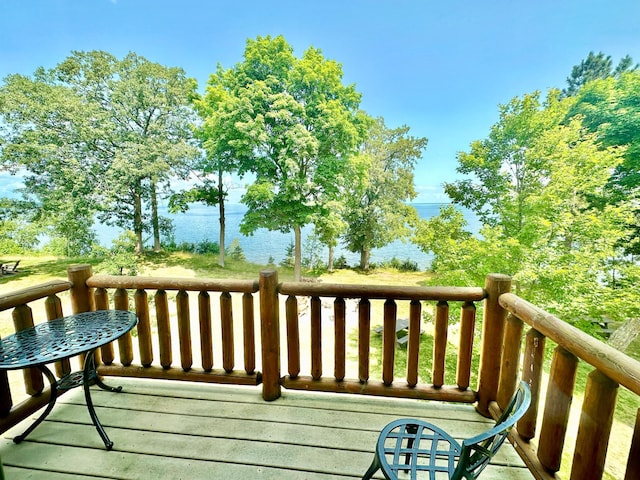 deck featuring a water view