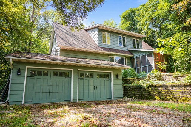 exterior space with a garage