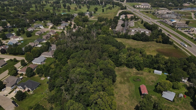 birds eye view of property featuring a residential view and a water view