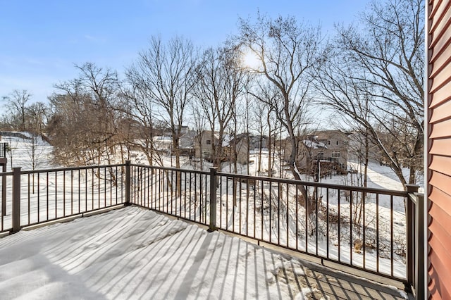 view of snow covered deck