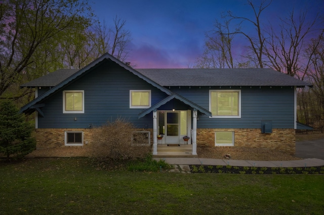 5745 Echo Rd, Excelsior, MN 55331 - raised ranch with a lawn, brick siding, and roof with shingles
