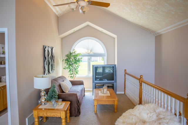 carpeted living room featuring lofted ceiling, ceiling fan, and a textured ceiling