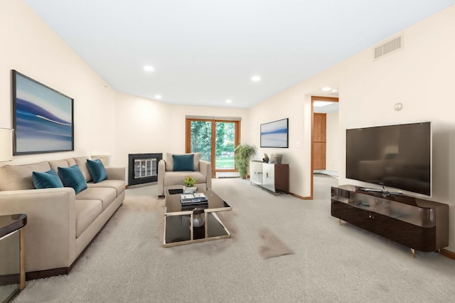 living room featuring light colored carpet