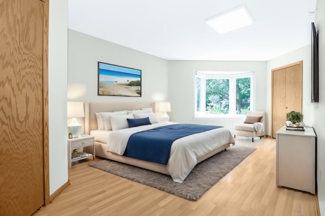 bedroom featuring light hardwood / wood-style floors