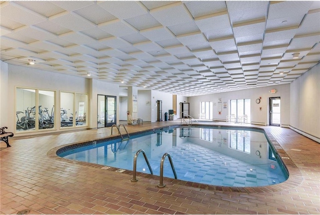 view of swimming pool with a jacuzzi