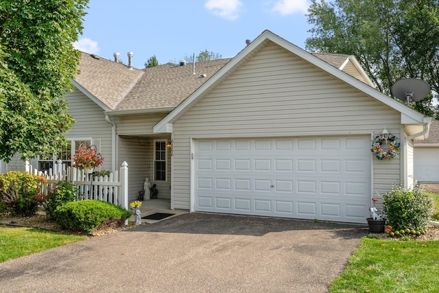 view of front of home featuring a garage