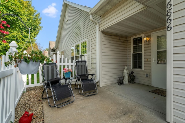 view of patio with fence