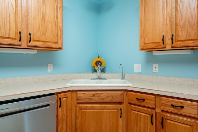 kitchen with dishwasher and sink