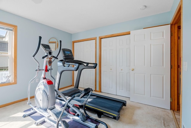 workout area with light colored carpet