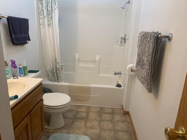 full bathroom with tile patterned flooring, toilet, vanity, and shower / bath combo with shower curtain