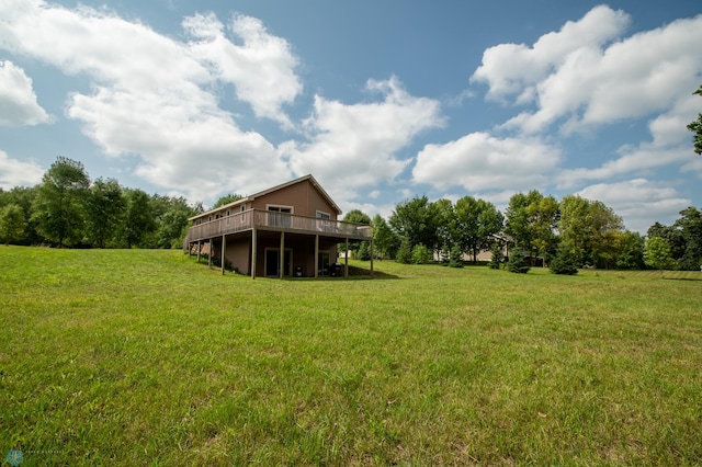 view of yard featuring a wooden deck