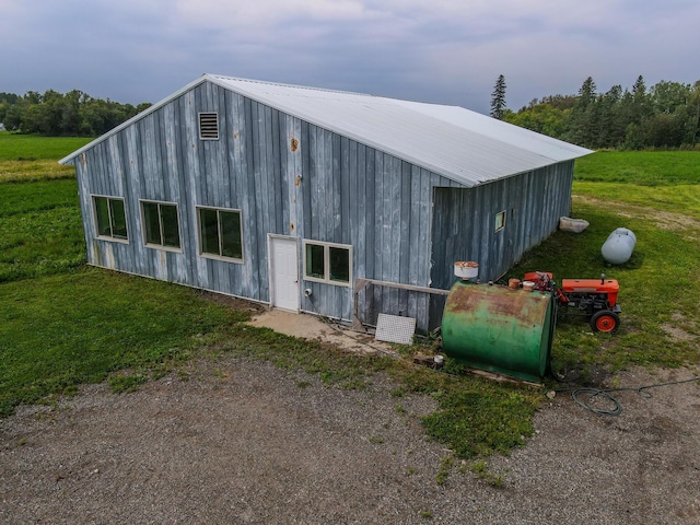 exterior space featuring a lawn and heating fuel