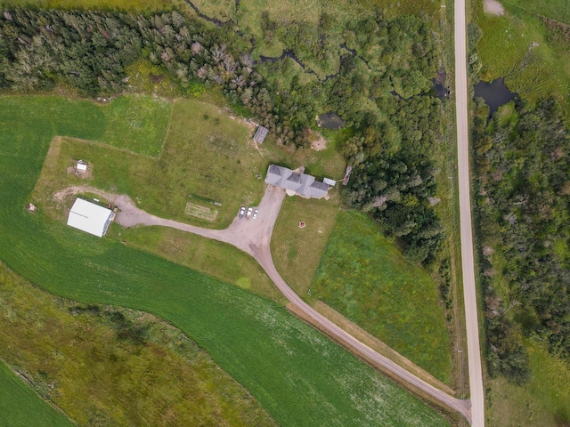 birds eye view of property featuring a rural view