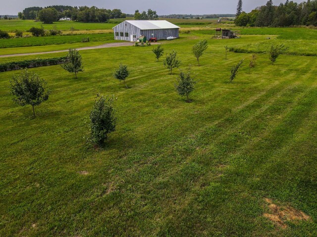 birds eye view of property featuring a rural view