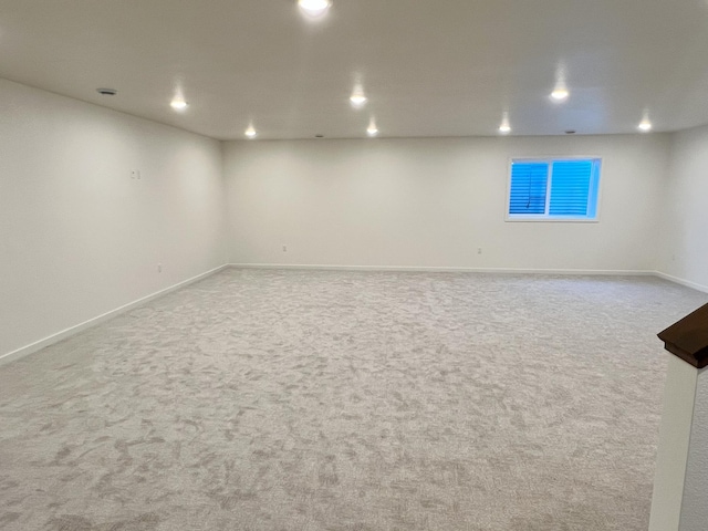 basement with light colored carpet