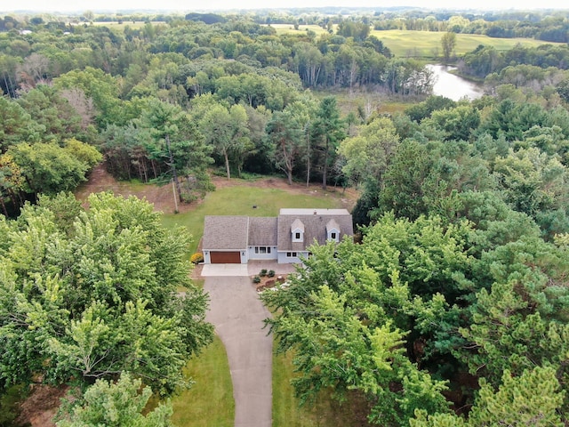 bird's eye view with a view of trees