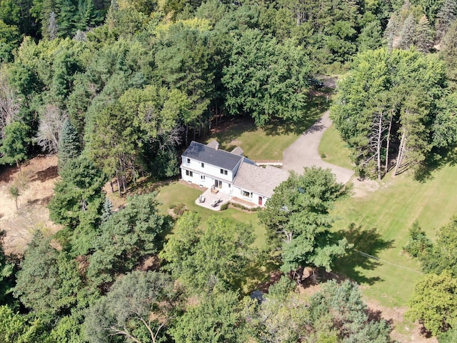 bird's eye view with a forest view