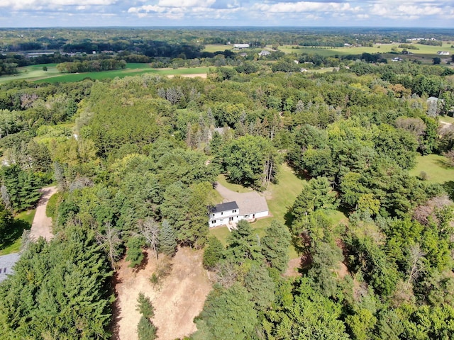 aerial view featuring a view of trees