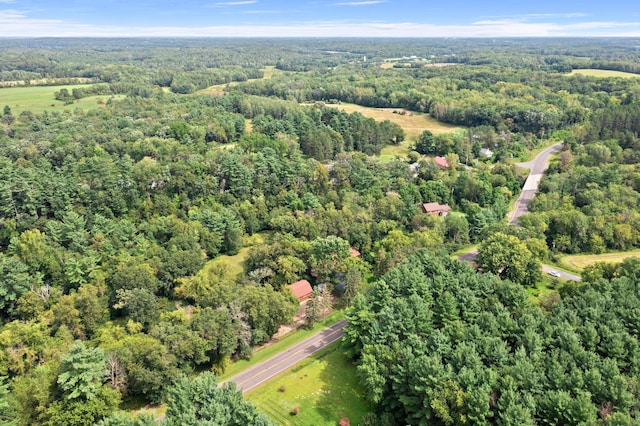 aerial view featuring a forest view