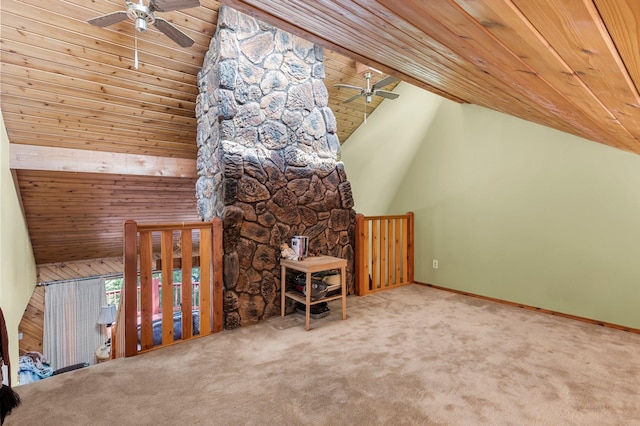 additional living space with ceiling fan, high vaulted ceiling, carpet floors, wood ceiling, and baseboards