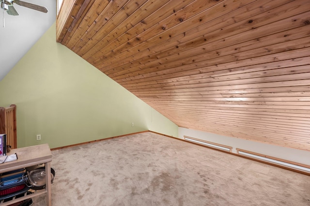 bonus room with lofted ceiling, ceiling fan, wooden ceiling, carpet flooring, and baseboards