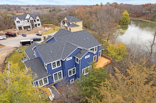 drone / aerial view with a water view