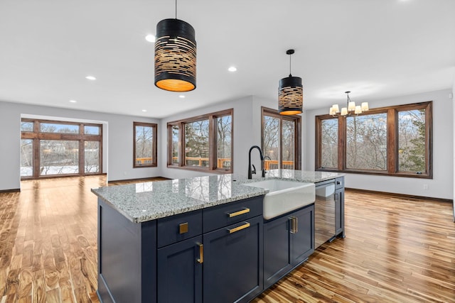 5534 Conifer Trl, Minnetonka, MN 55345 - kitchen with a sink, stainless steel dishwasher, healthy amount of natural light, light wood-style floors, and recessed lighting