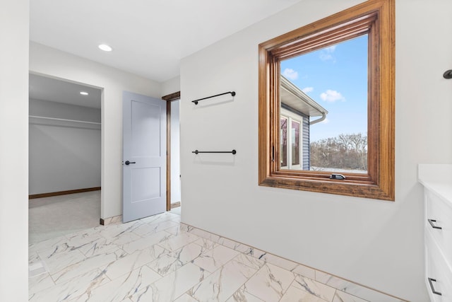 5534 Conifer Trl, Minnetonka, MN 55345 - unfurnished bedroom with baseboards, light marble finish flooring, recessed lighting, and a closet