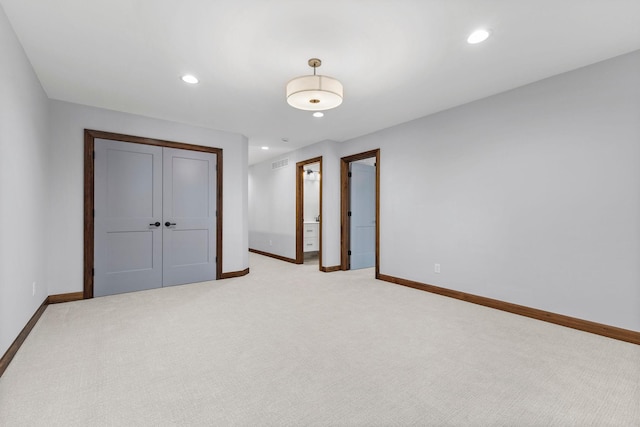 5534 Conifer Trl, Minnetonka, MN 55345 - unfurnished bedroom featuring baseboards, light colored carpet, recessed lighting, and a closet
