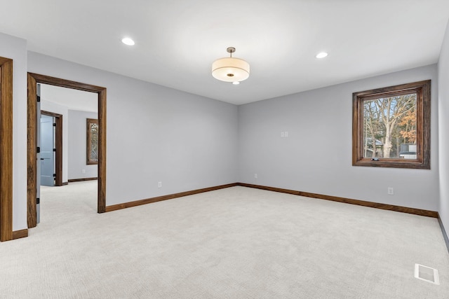 5534 Conifer Trl, Minnetonka, MN 55345 - unfurnished room with light carpet, baseboards, and recessed lighting