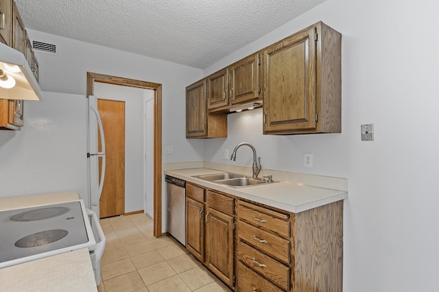 kitchen featuring a textured ceiling, sink, white appliances, light tile patterned floors, and extractor fan