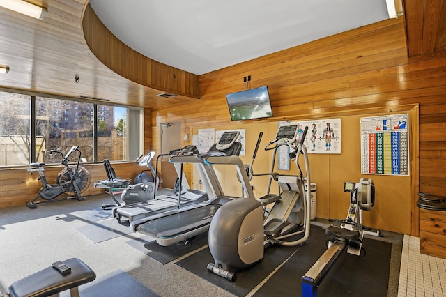 gym with wood walls