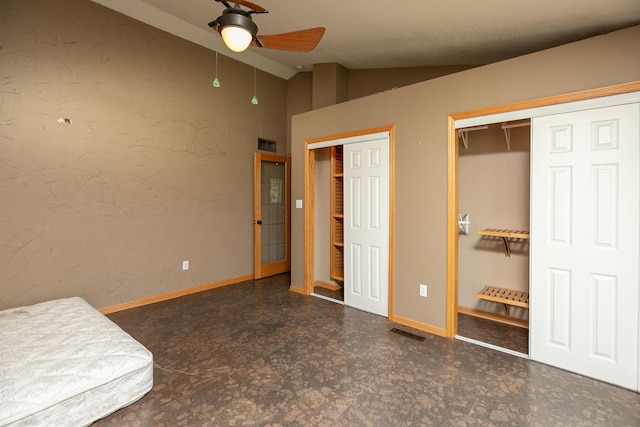 unfurnished bedroom featuring ceiling fan, tile patterned flooring, and lofted ceiling