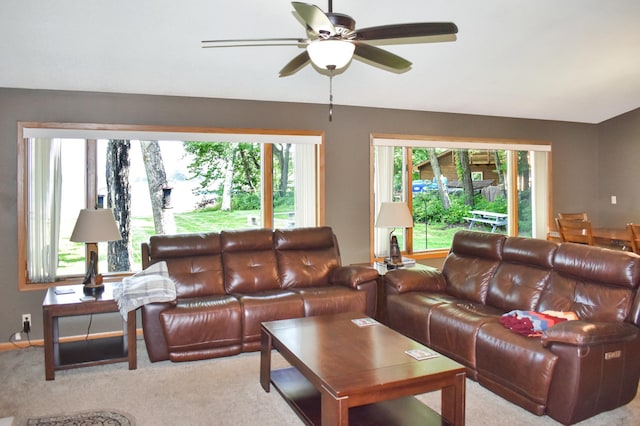 living room with carpet floors and ceiling fan