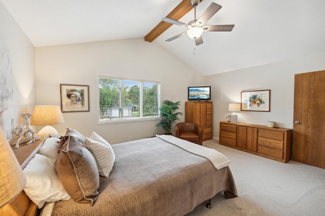 bedroom featuring vaulted ceiling with beams, ceiling fan, and light colored carpet