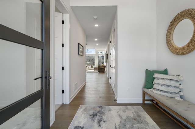 hall featuring wood-type flooring