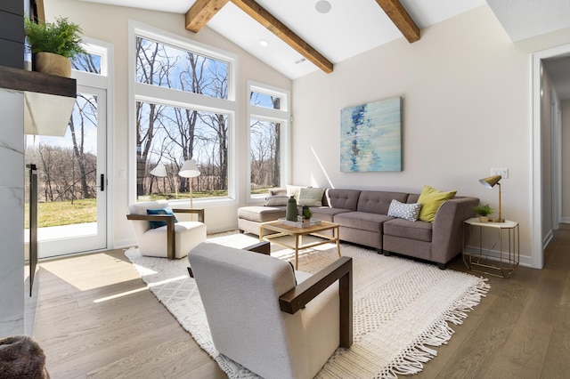 living room with beamed ceiling, high vaulted ceiling, and hardwood / wood-style flooring