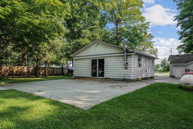 view of outdoor structure with a lawn