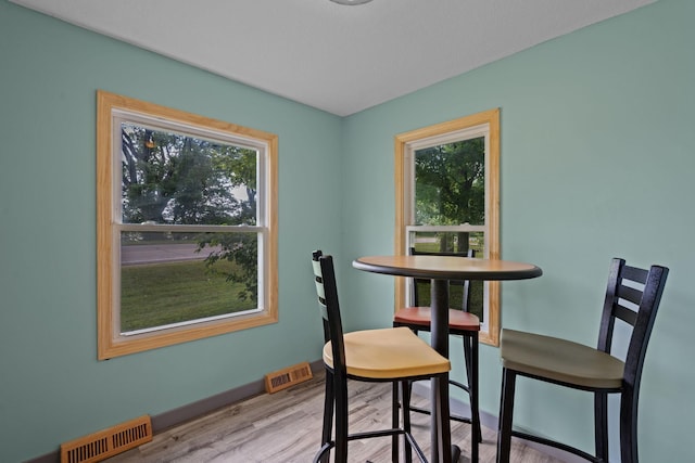 dining space featuring light hardwood / wood-style floors