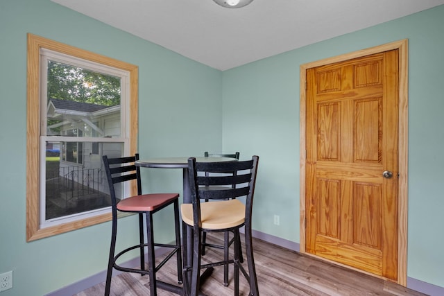 dining room with light wood-type flooring