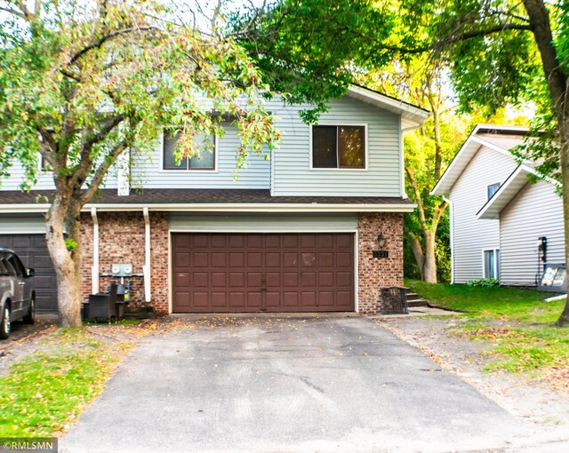 front of property featuring a garage