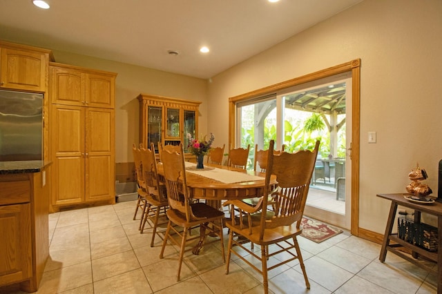 dining space with recessed lighting and light tile patterned floors