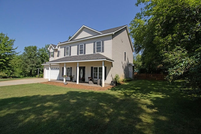 view of front facade with a porch, a front yard, fence, concrete driveway, and an attached garage