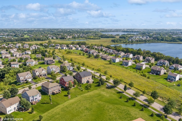 bird's eye view with a water view and a residential view