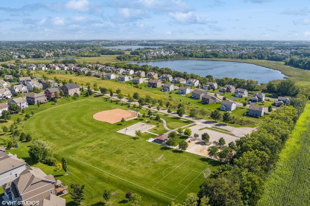 aerial view featuring a residential view and a water view