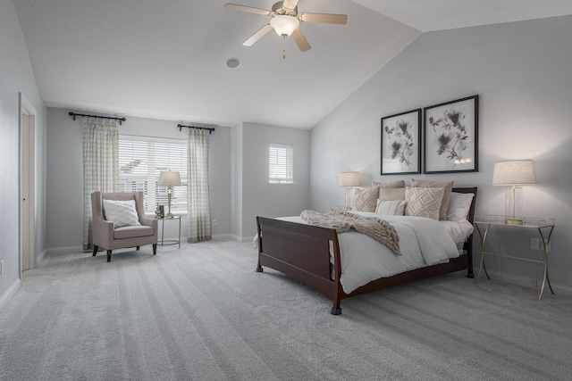 bedroom featuring vaulted ceiling, carpet flooring, a ceiling fan, and baseboards